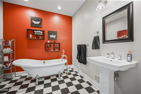 a view of a yard with a house in the background