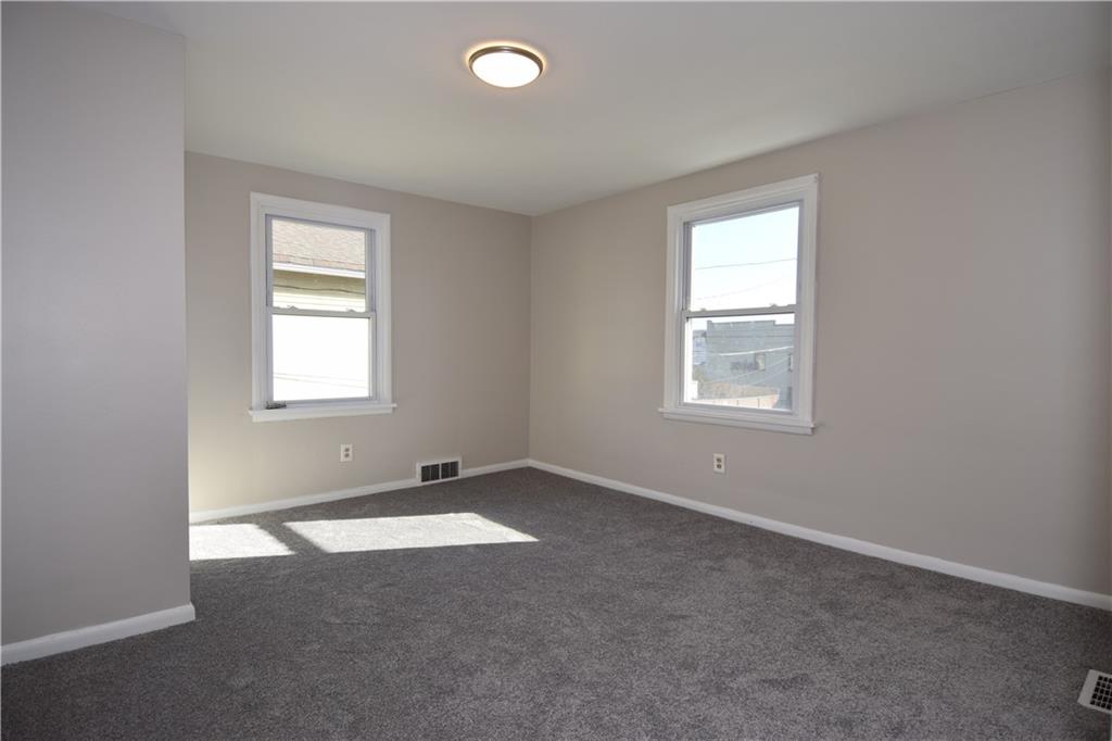 420 Jefferson Street Rochester, PA 15074 - Photo 14 of 19 an empty room with windows