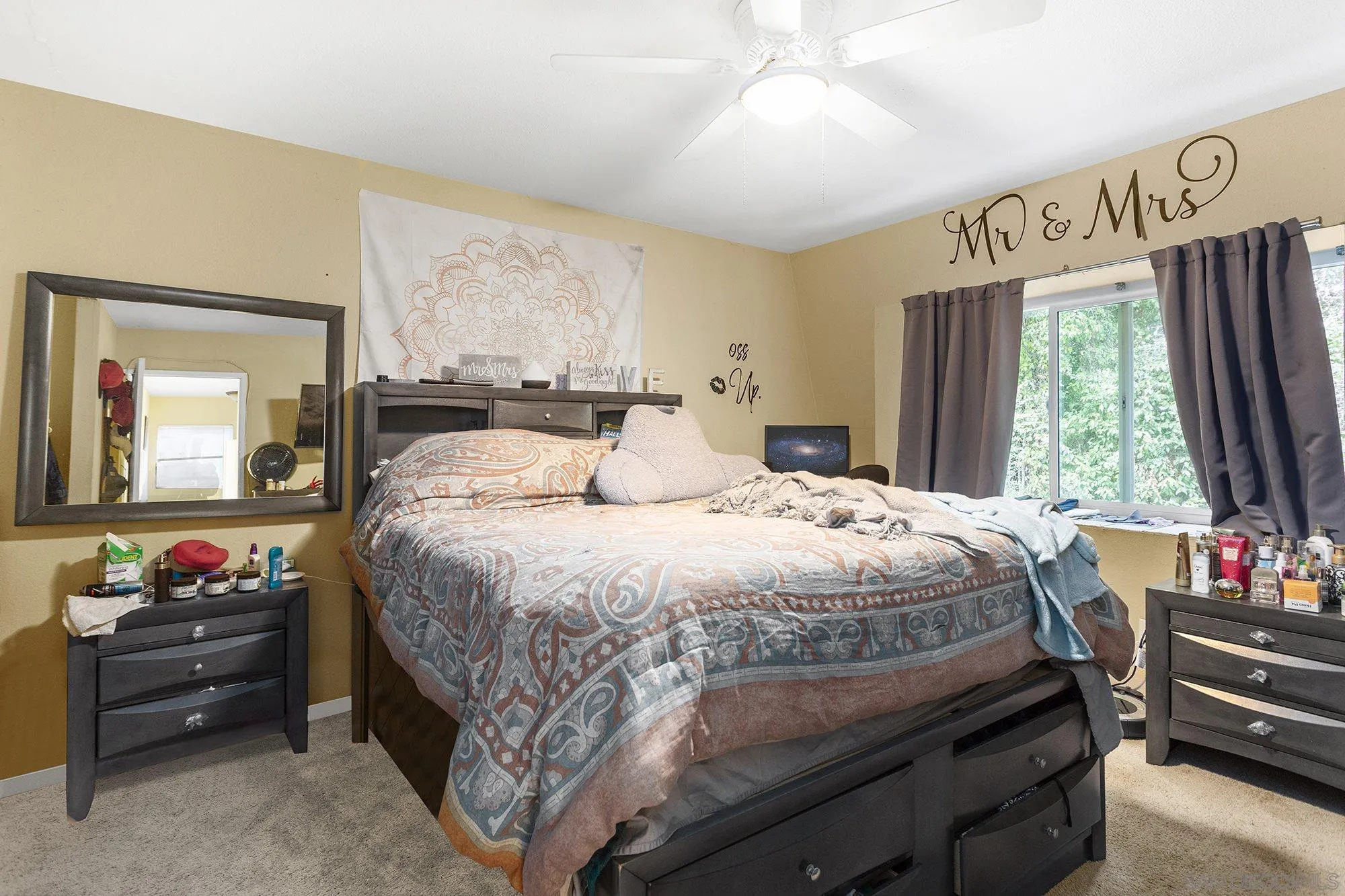 9041 Rosedale Drive, Unit A/B Spring Valley, CA 91977 - Photo 16 of 37 a bed room with a bed and a window
