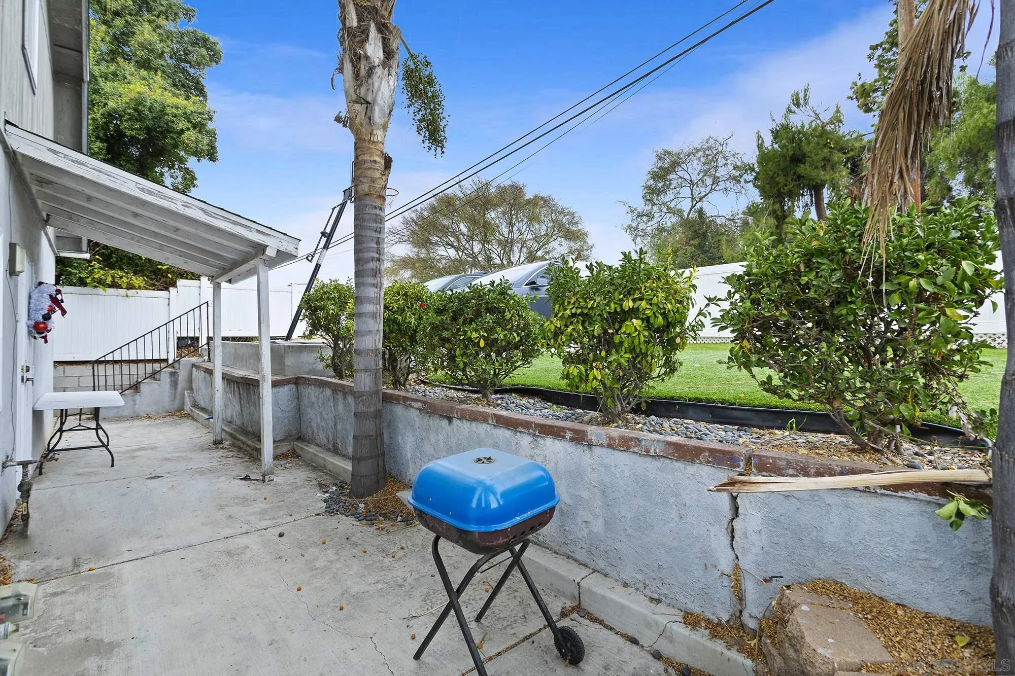 9041 Rosedale Drive, Unit A/B Spring Valley, CA 91977 - Photo 19 of 37 a view of a chairs and table in the patio