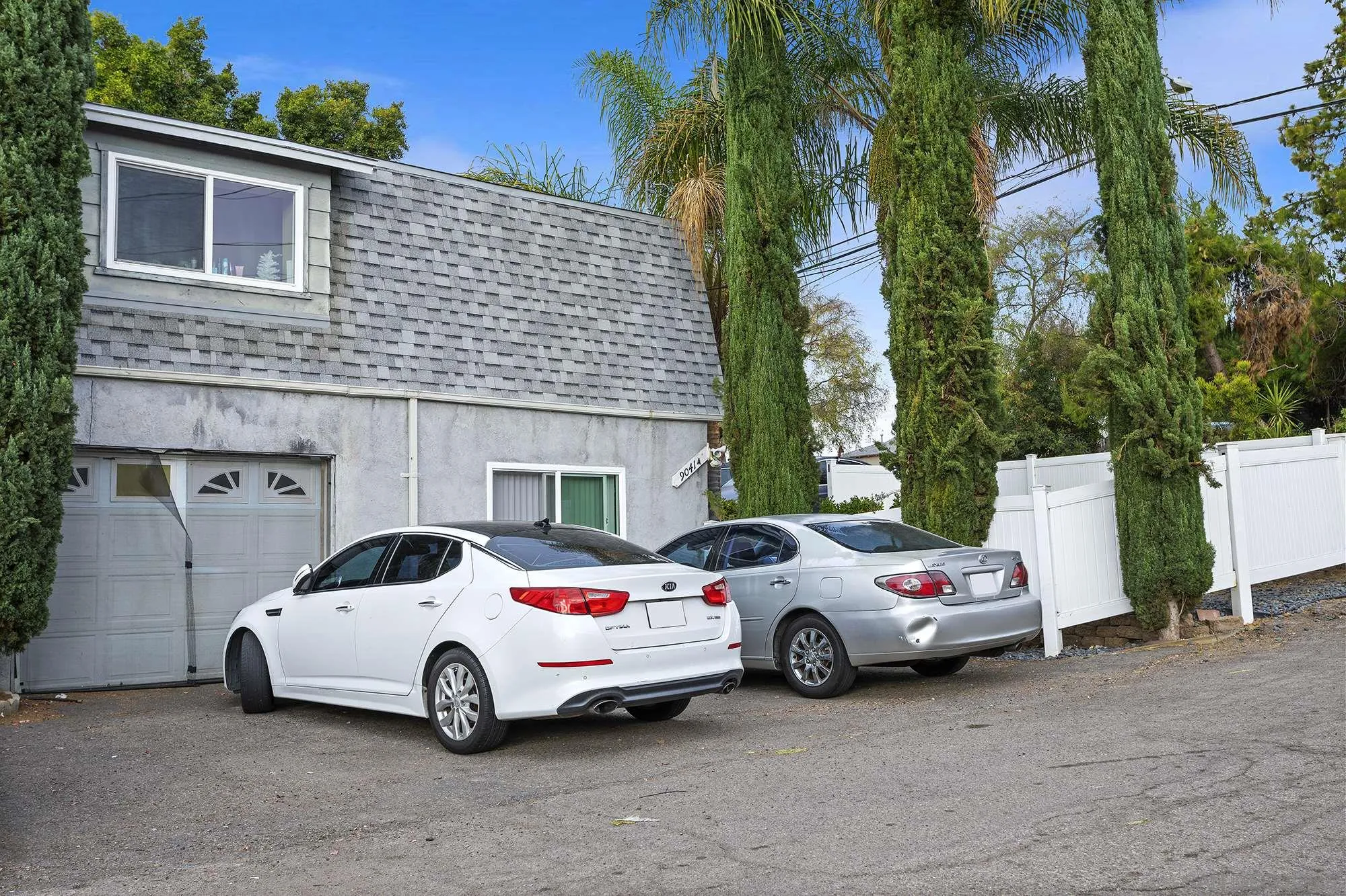 9041 Rosedale Drive, Unit A/B Spring Valley, CA 91977 - Photo 2 of 37 a view of a cars parked in front of a house