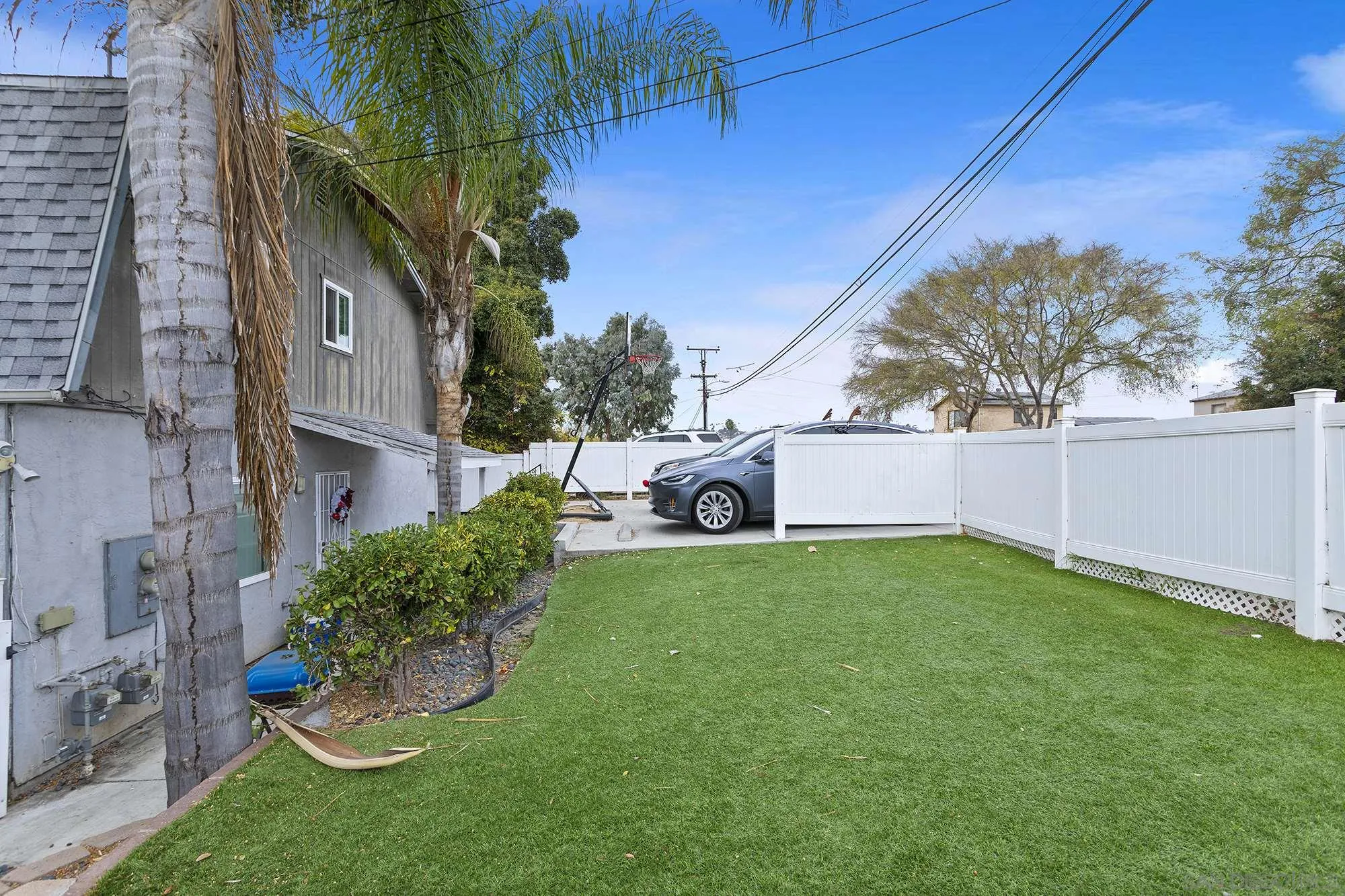 9041 Rosedale Drive, Unit A/B Spring Valley, CA 91977 - Photo 21 of 37 a view of a backyard with plants and a barbeque