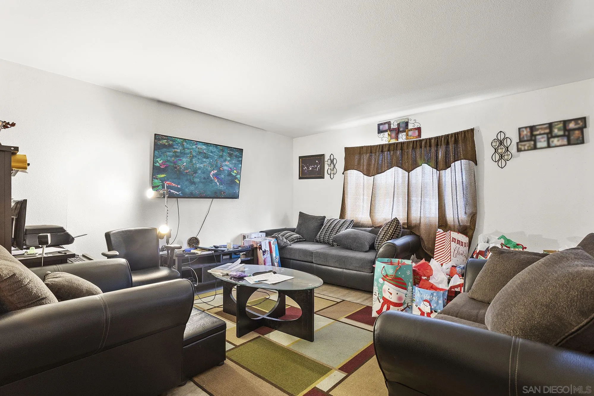 9041 Rosedale Drive, Unit A/B Spring Valley, CA 91977 - Photo 23 of 37 a living room with furniture and a couch