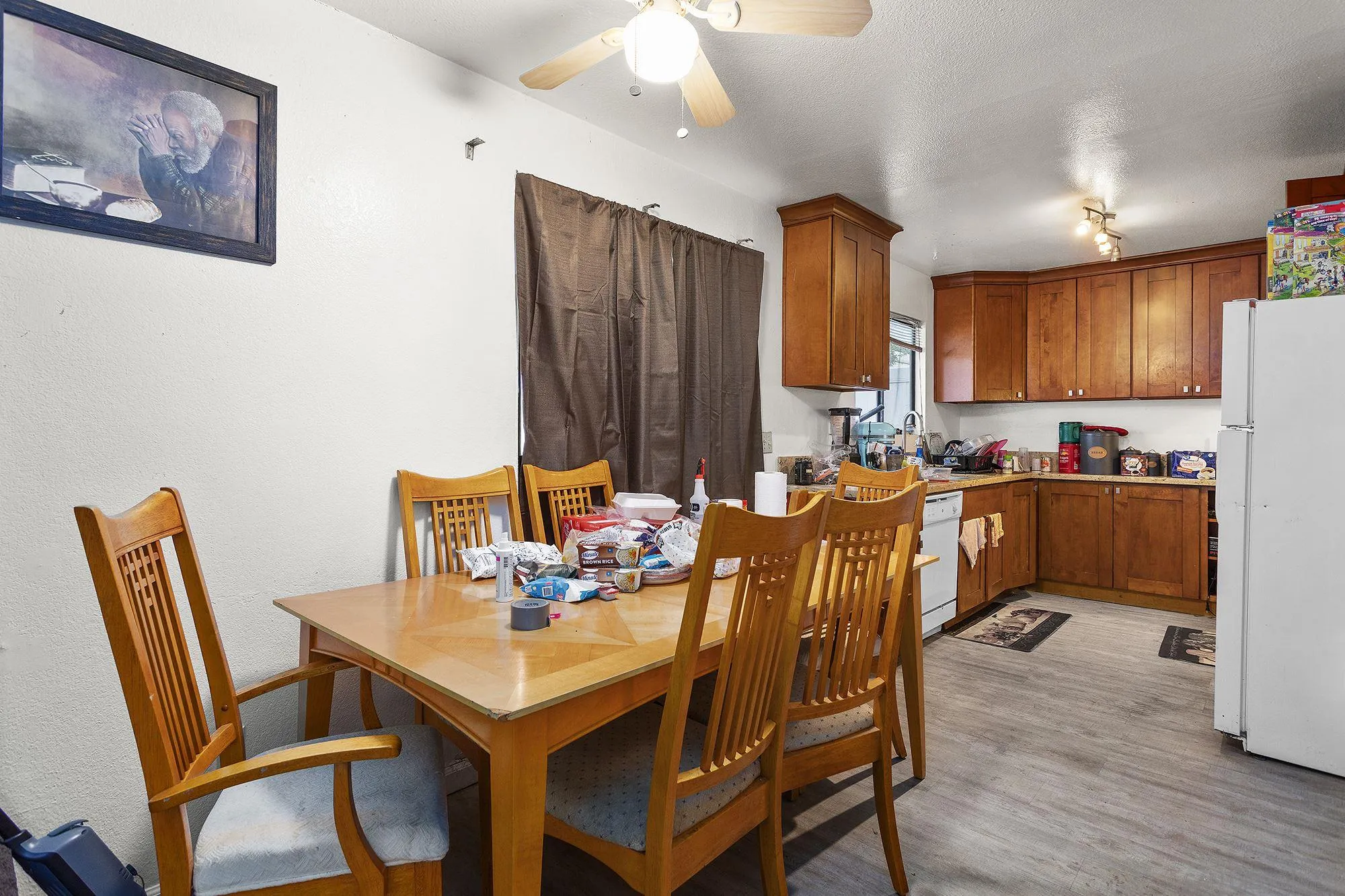 9041 Rosedale Drive, Unit A/B Spring Valley, CA 91977 - Photo 25 of 37 a dining room with furniture and wooden floor