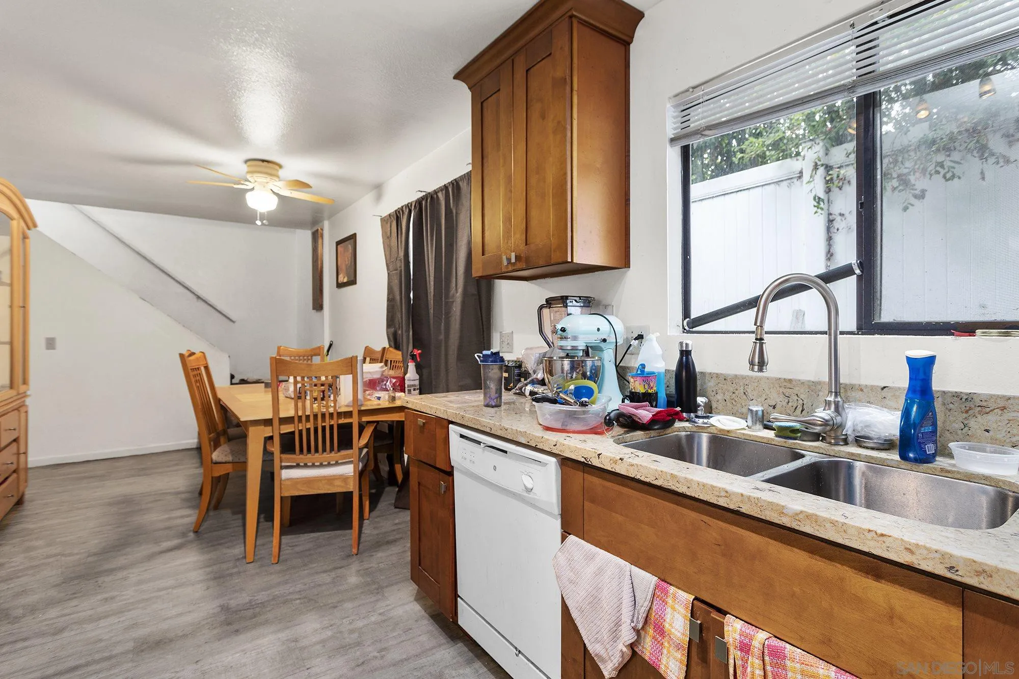9041 Rosedale Drive, Unit A/B Spring Valley, CA 91977 - Photo 28 of 37 a kitchen with a sink cabinets and window