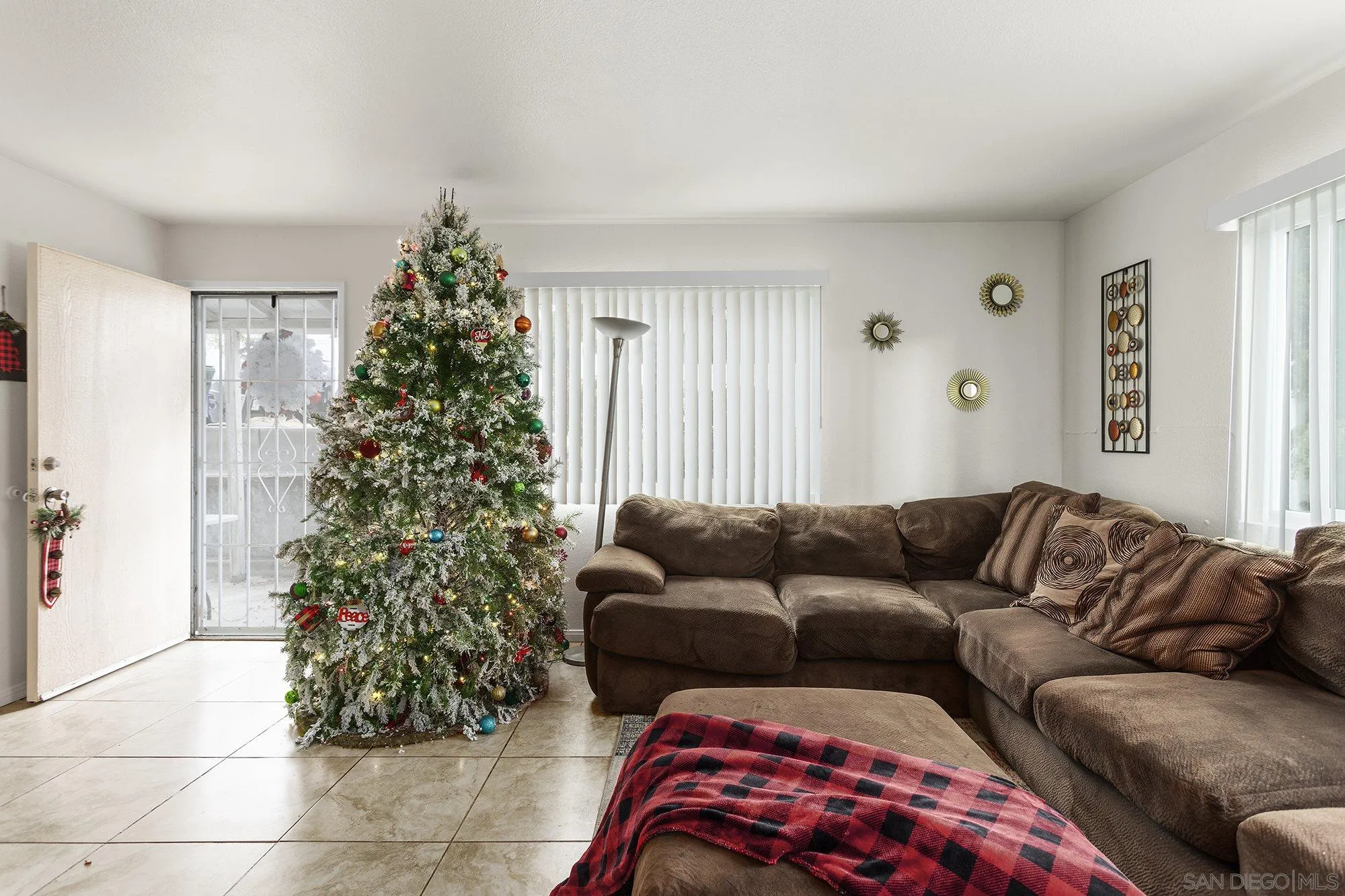 9041 Rosedale Drive, Unit A/B Spring Valley, CA 91977 - Photo 6 of 37 a living room with furniture and a christmas tree
