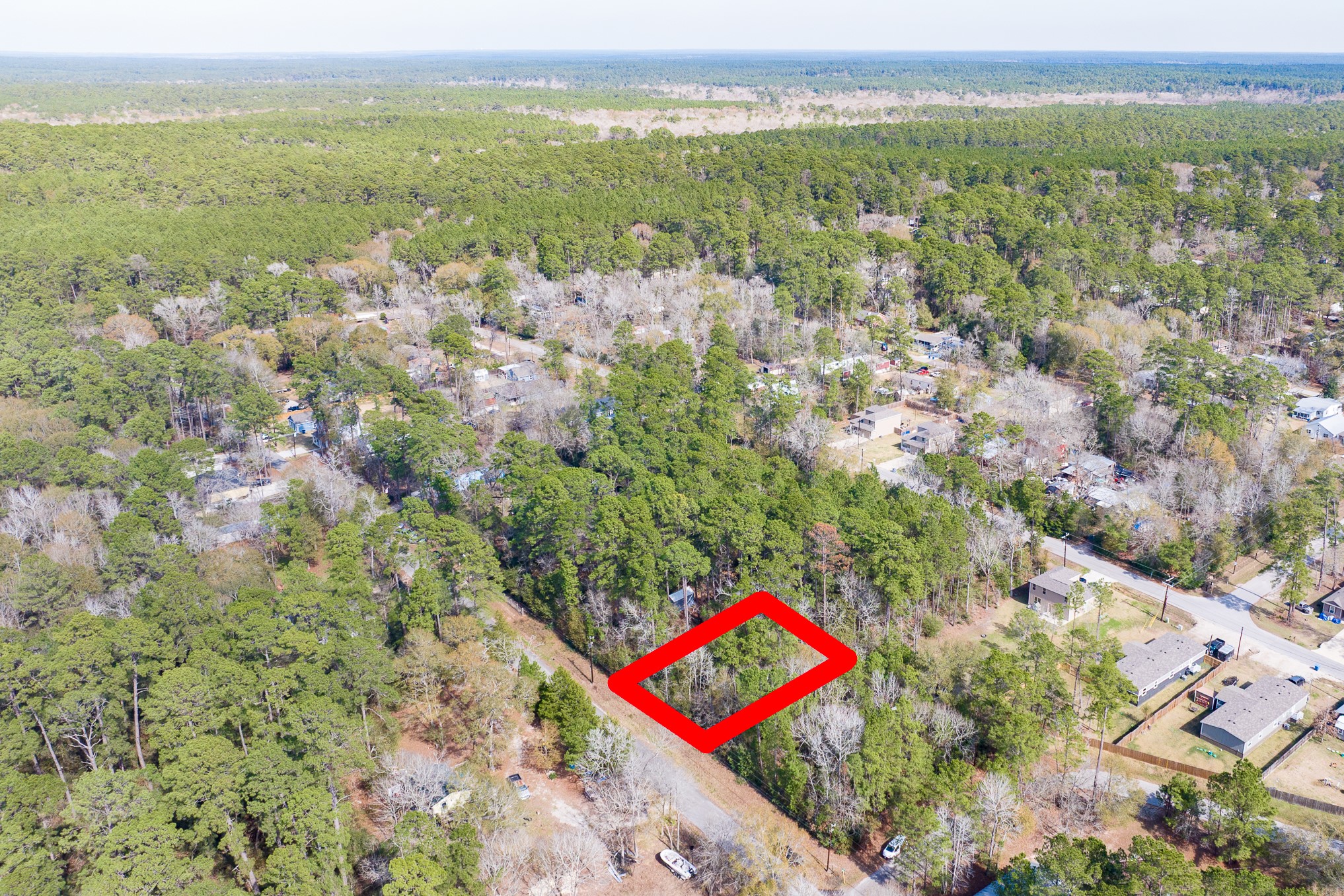 0 Forest Drive Montgomery, TX 77356 - Photo 4 of 29 an aerial view of residential houses with outdoor space and trees