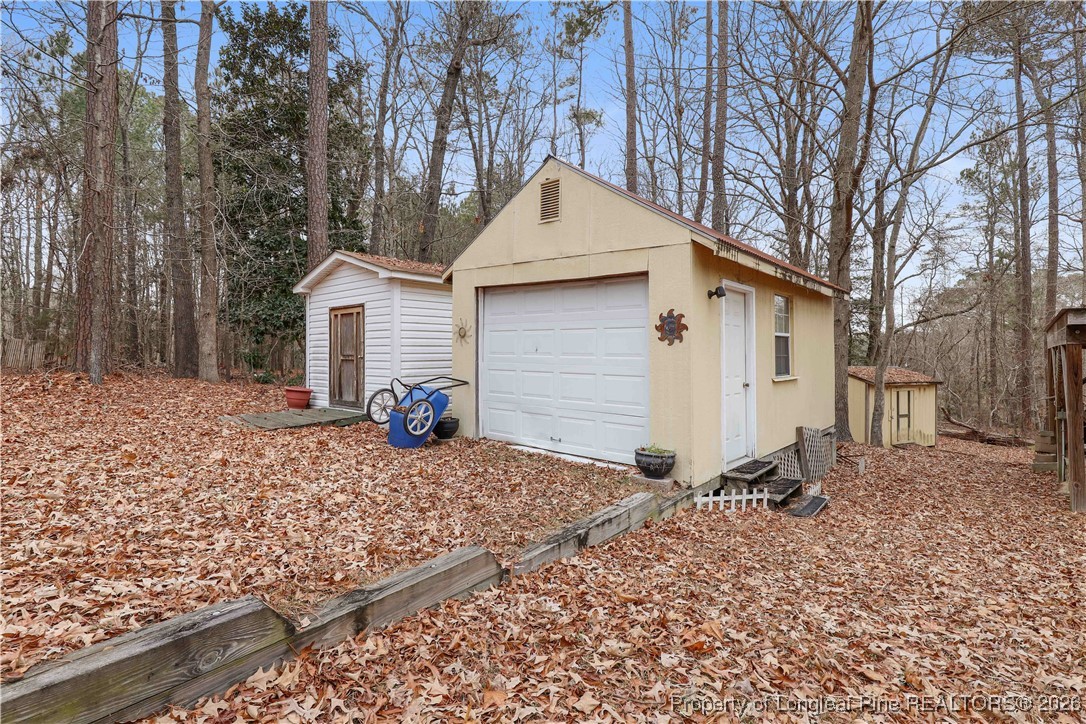 156 Connell Road Carthage, NC 28327 - Photo 30 of 43 a house view with a outdoor space