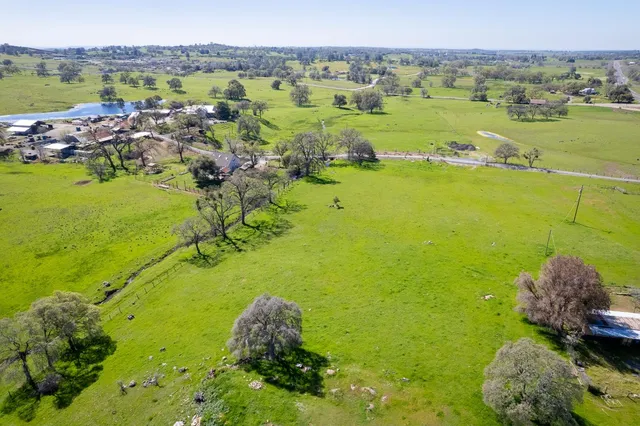 an aerial view of a golf course with a garden
