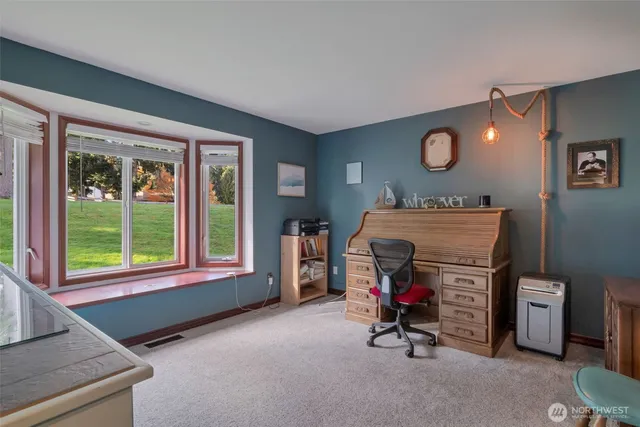 a bathroom with a mirror sink and shower