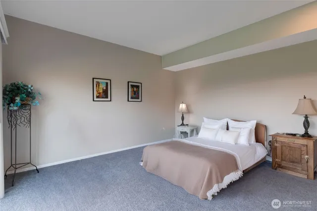 a utility room with sink dryer and washer
