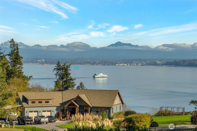 a view of houses with an outdoor space and seating