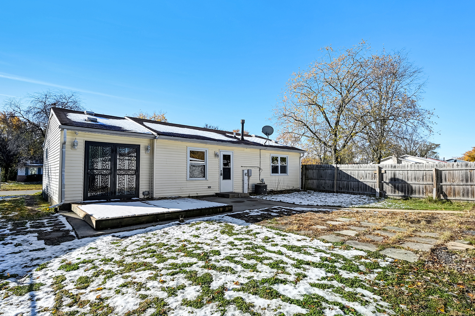 3618 Peach Grove Lane Hazel Crest, IL 60429 - Photo 15 of 16 a front view of a house with a yard