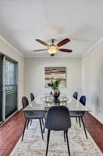 a workspace with furniture and wooden floor