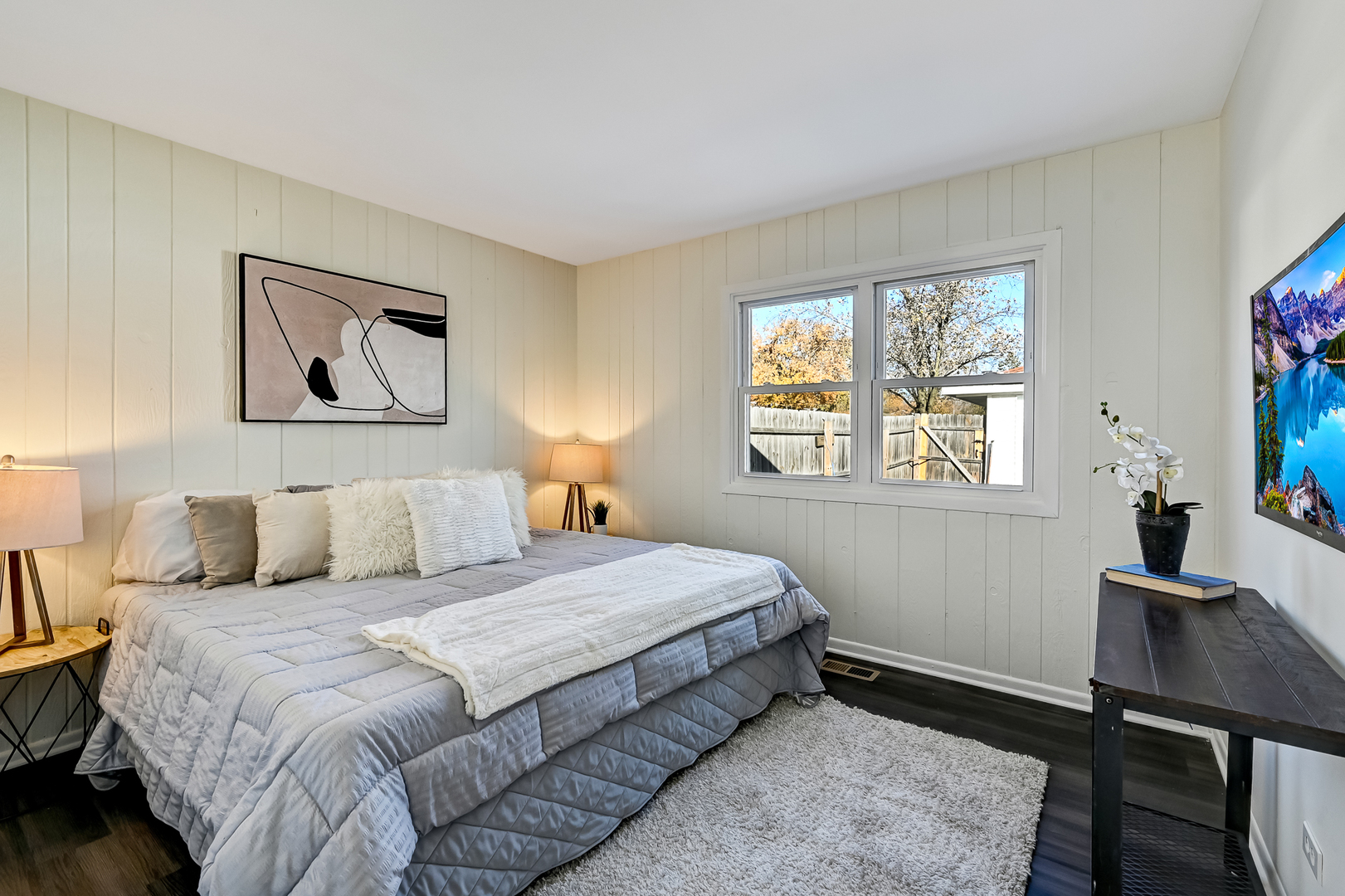 3618 Peach Grove Lane Hazel Crest, IL 60429 - Photo 9 of 16 a bedroom with a bed and a window