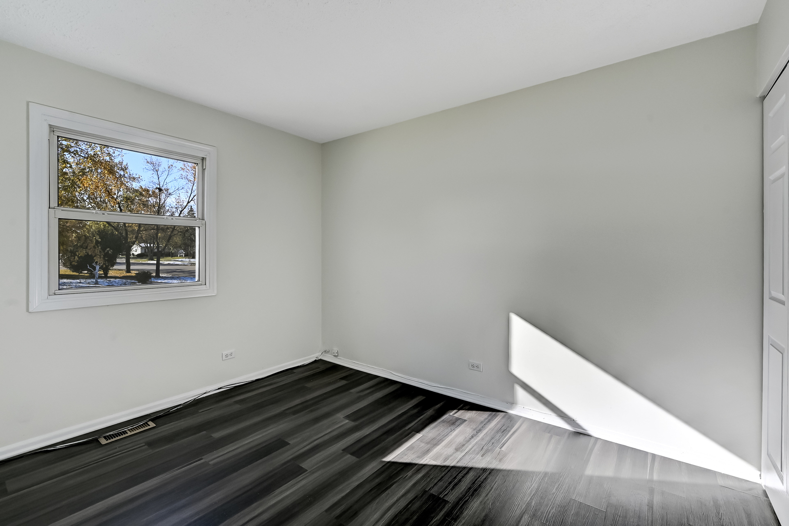 3618 Peach Grove Lane Hazel Crest, IL 60429 - Photo 10 of 16 a view of an empty room and wooden floor