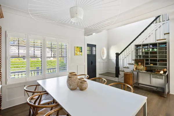 a view of a dining room with furniture window and outside view