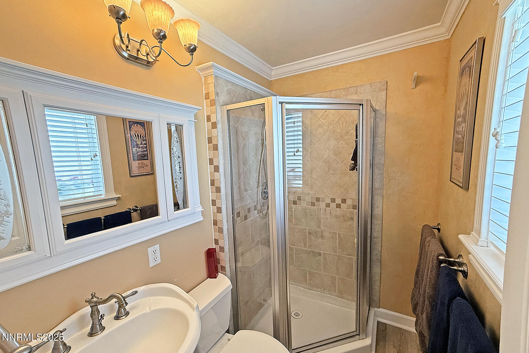 3050 Attridge Place Reno, NV 89503 - Photo 40 of 62 a bathroom with a sink and a mirror