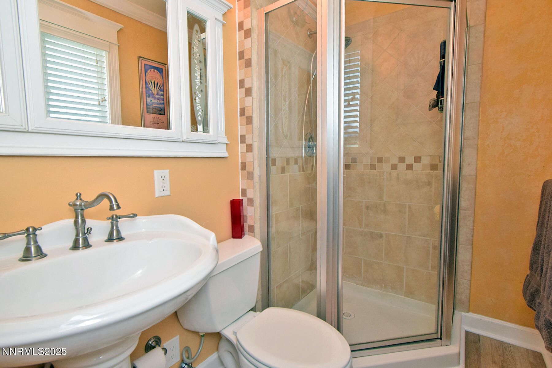 3050 Attridge Place Reno, NV 89503 - Photo 42 of 62 a bathroom with a sink and a toilet