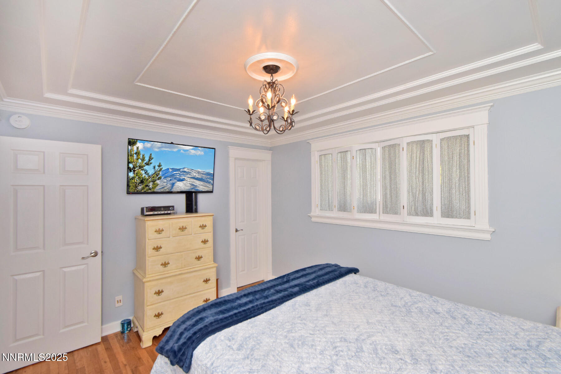 3050 Attridge Place Reno, NV 89503 - Photo 45 of 62 a bedroom with a bed and a dresser