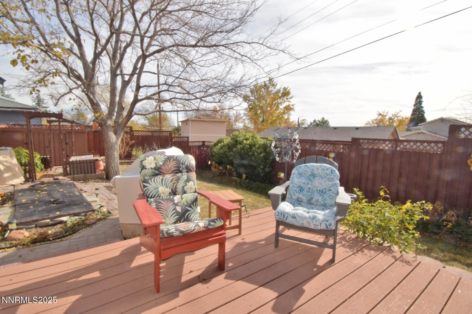 3050 Attridge Place Reno, NV 89503 - Photo 48 of 62 a roof deck with table and chairs and potted plants