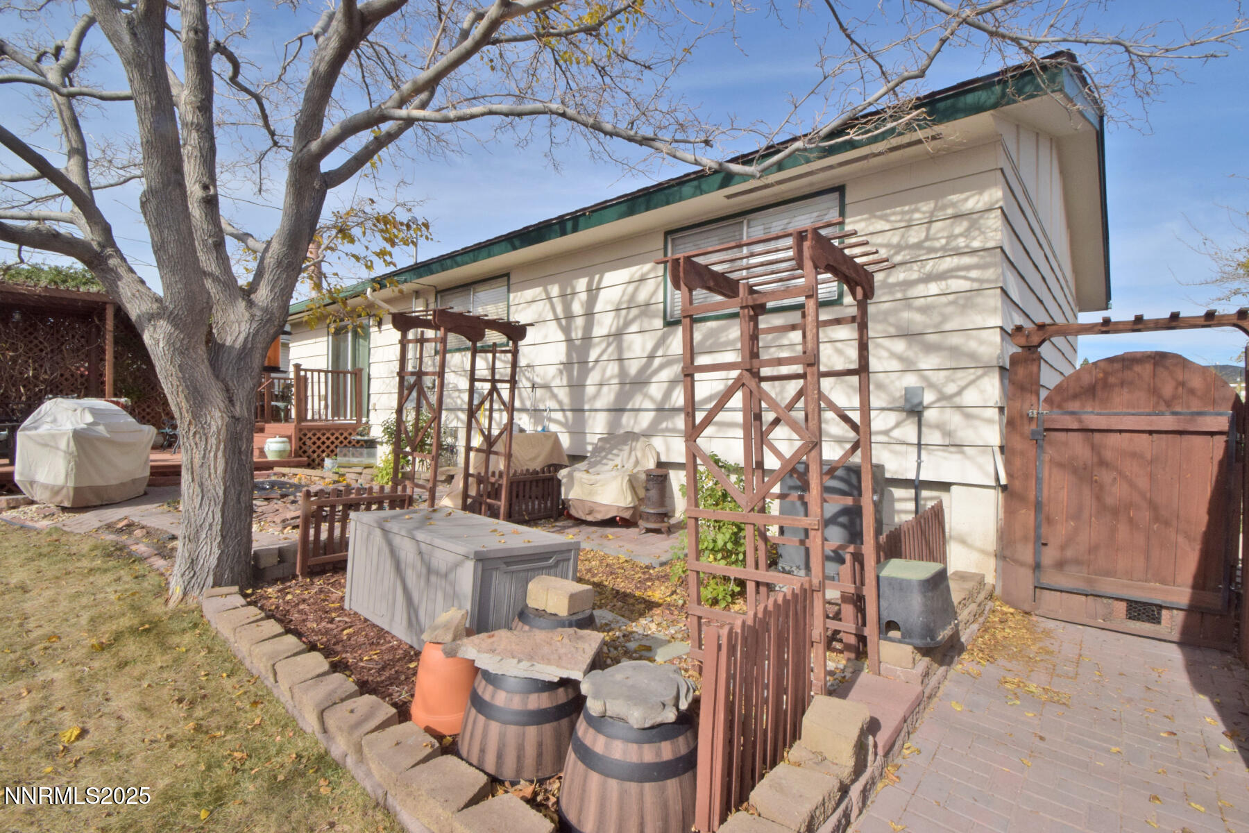 3050 Attridge Place Reno, NV 89503 - Photo 50 of 62 a outdoor space with the couches and large trees