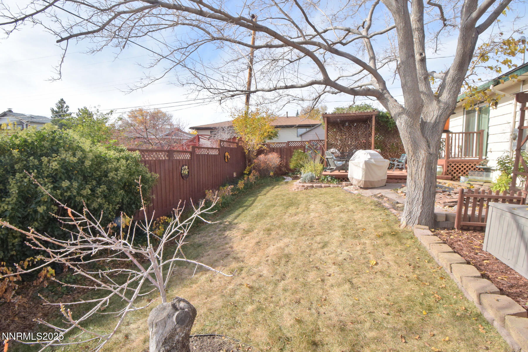 3050 Attridge Place Reno, NV 89503 - Photo 51 of 62 a backyard of a house with table and chairs