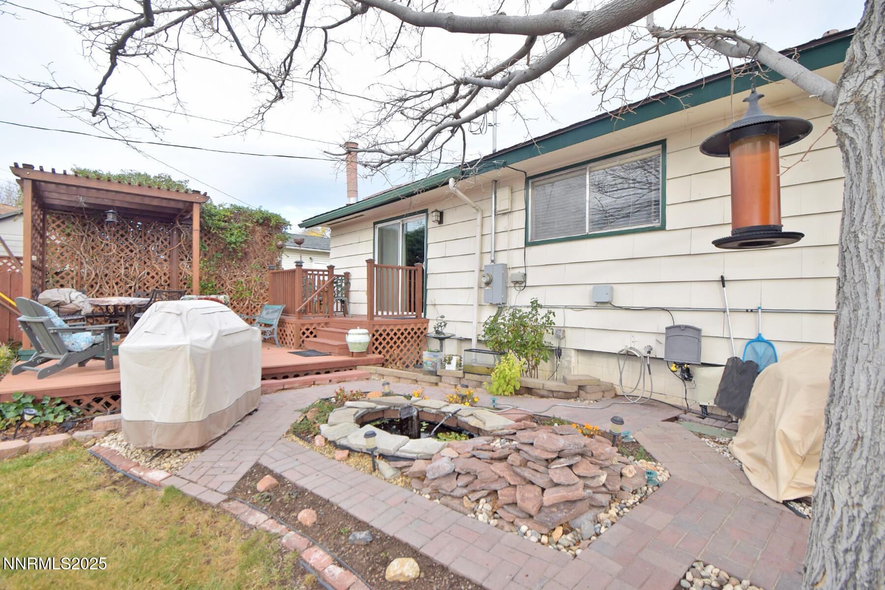 3050 Attridge Place Reno, NV 89503 - Photo 55 of 62 a front view of a house with patio