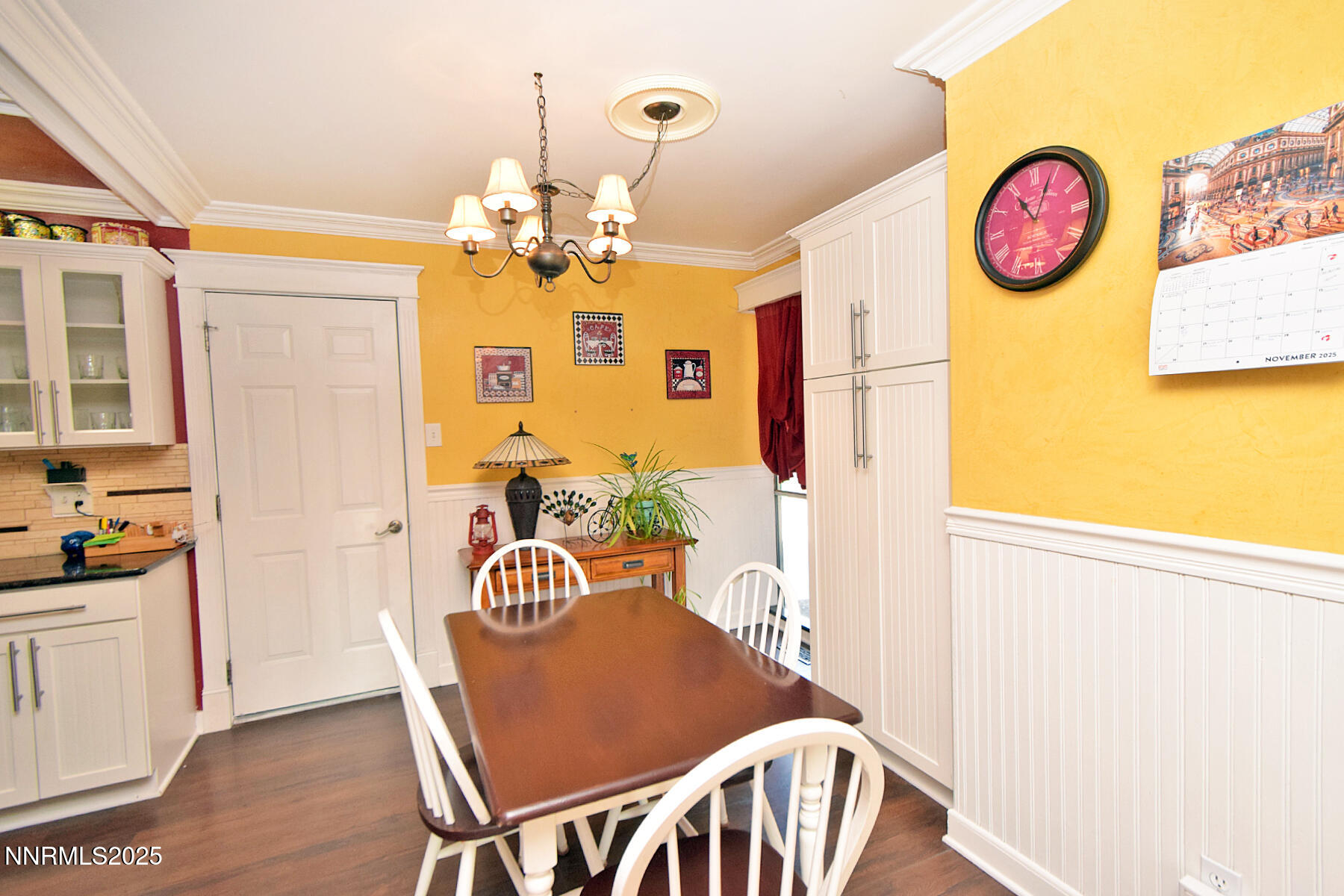 3050 Attridge Place Reno, NV 89503 - Photo 8 of 62 a view of a dining room with furniture and wooden floor