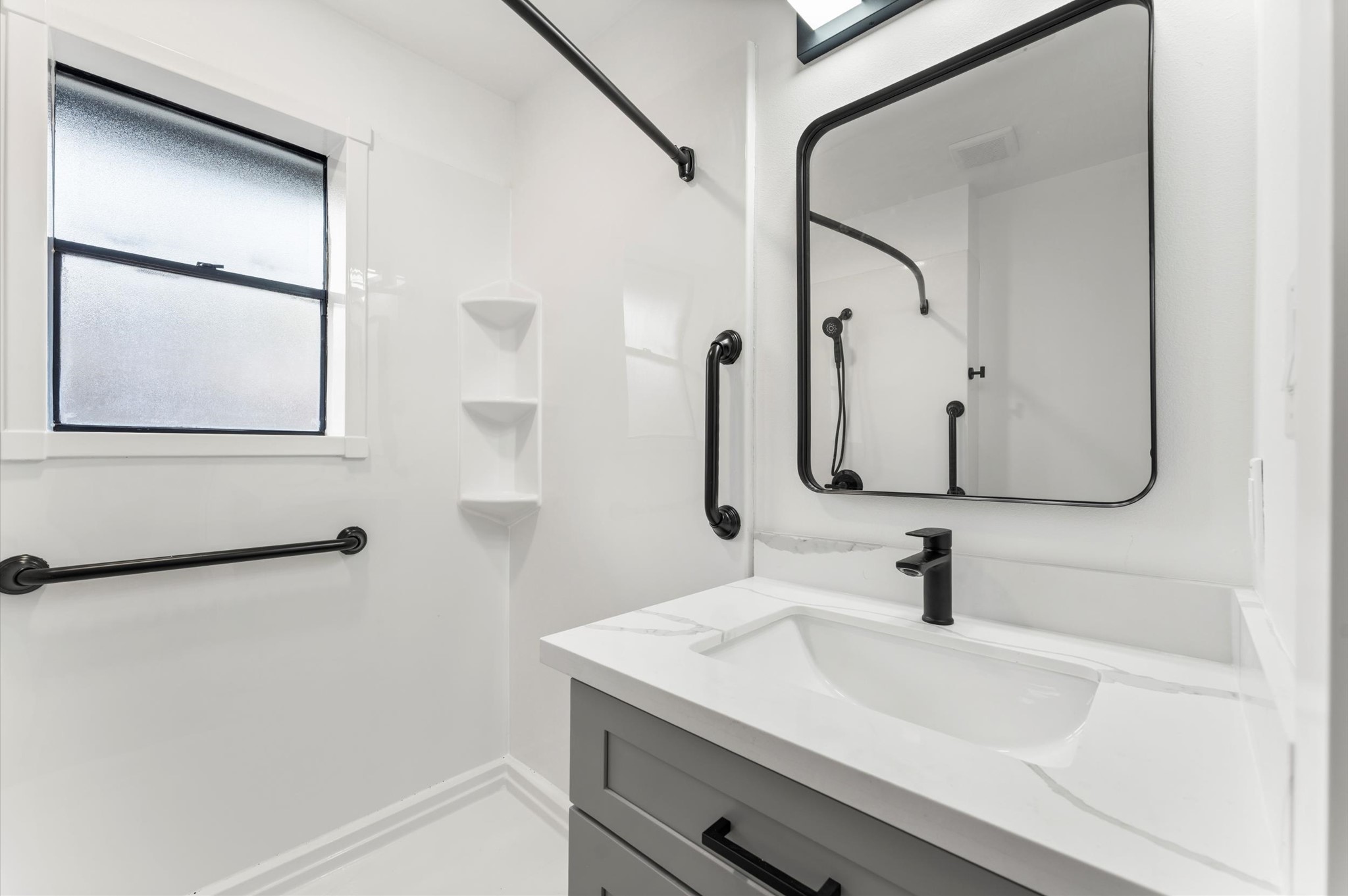 29514 Loddington Street Spring, TX 77386 - Photo 21 of 38 a bathroom with a sink and a mirror