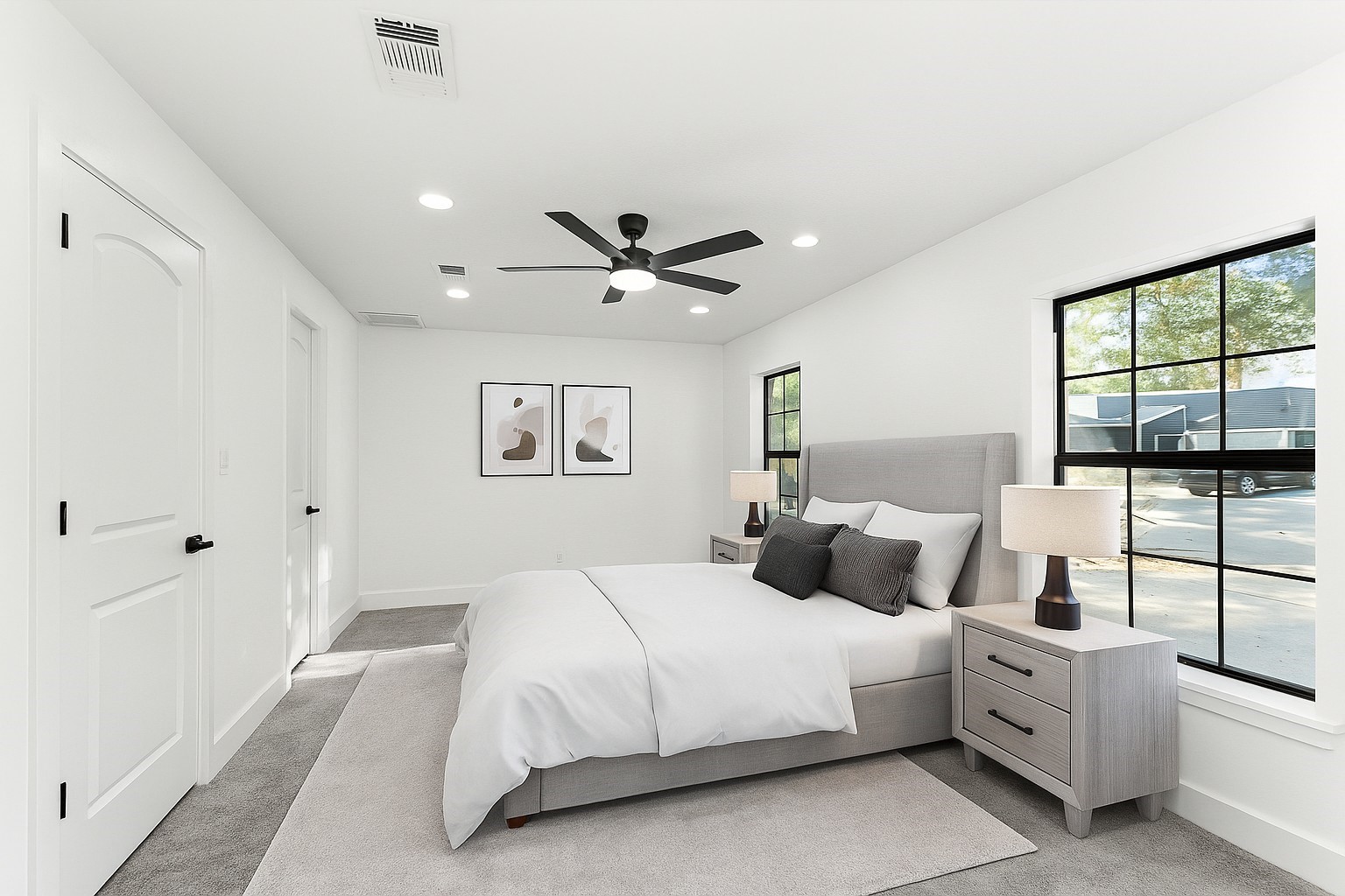 29514 Loddington Street Spring, TX 77386 - Photo 26 of 38 a bedroom with a large bed and a ceiling fan