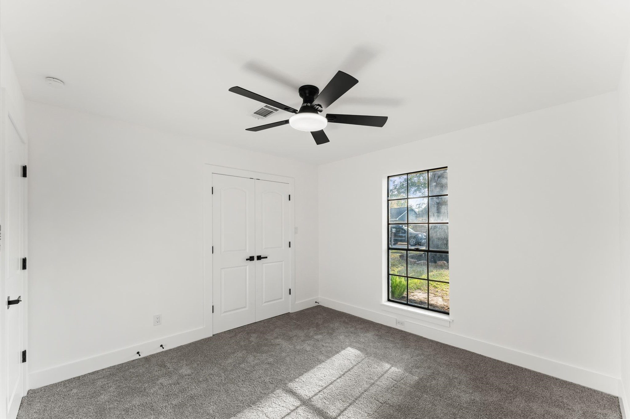 29514 Loddington Street Spring, TX 77386 - Photo 30 of 38 wooden floor in an empty room with a window
