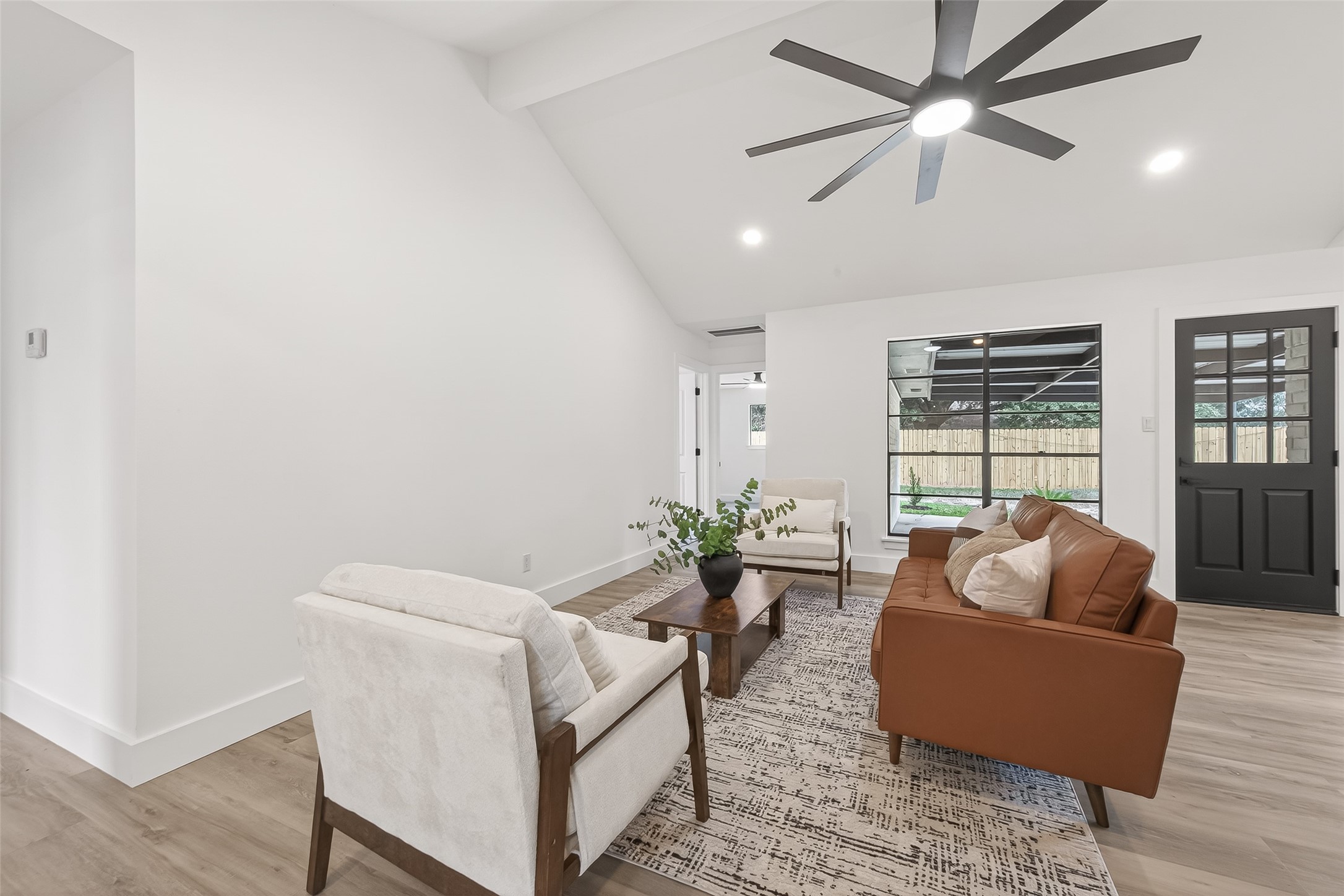 29514 Loddington Street Spring, TX 77386 - Photo 7 of 38 a living room with furniture and a large window