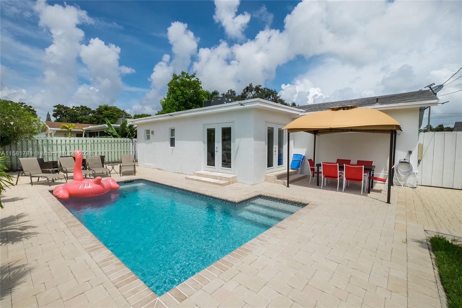 210 Southeast 4th Street Dania Beach, FL 33004 - Photo 13 of 16 swimming pool view with seating space