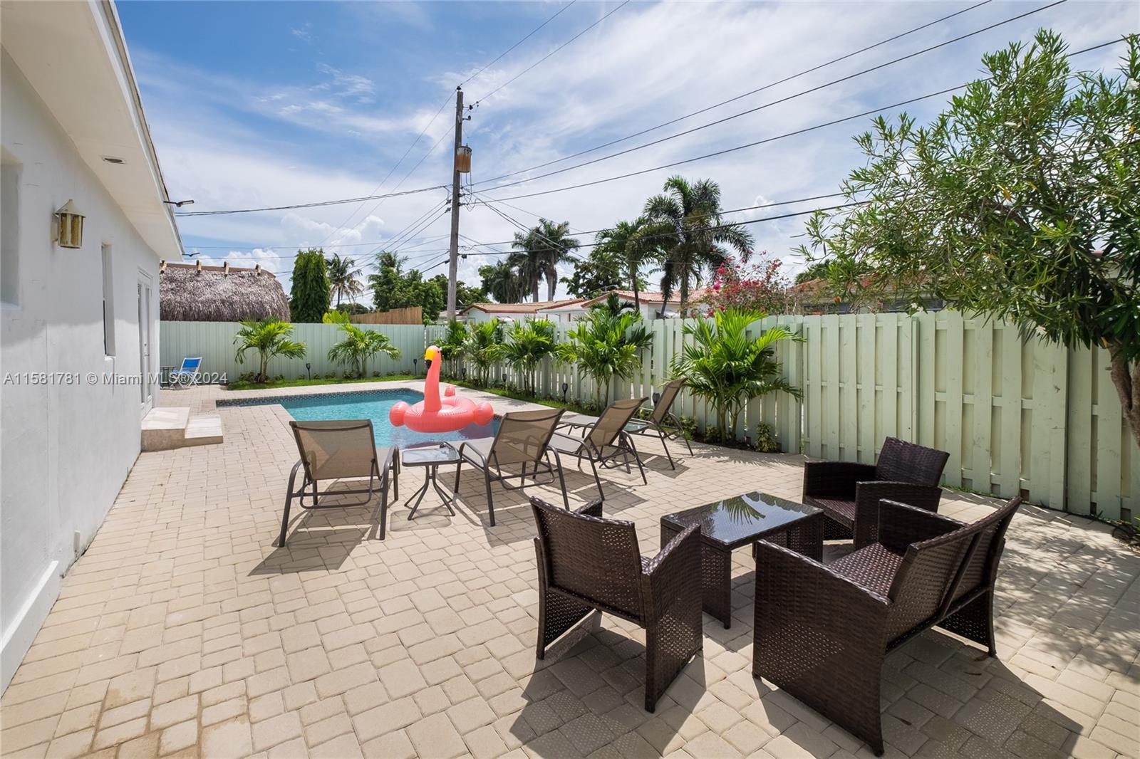 210 Southeast 4th Street Dania Beach, FL 33004 - Photo 14 of 16 a patio with tables and chairs