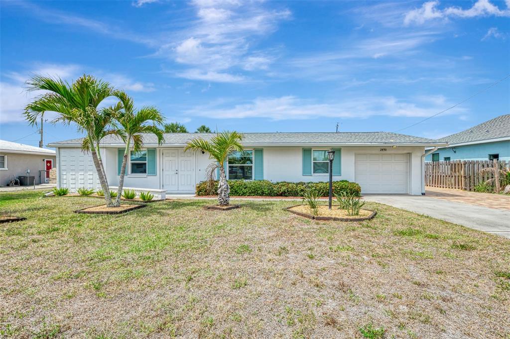 2490 Eleventh Street Englewood, FL 34224 - Photo 1 of 49 a house view with a seating space