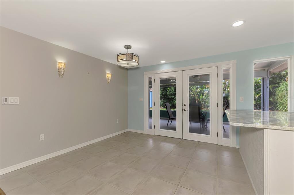 2490 Eleventh Street Englewood, FL 34224 - Photo 11 of 49 a view of an empty room with a window