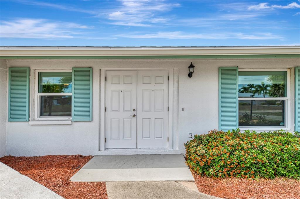 2490 Eleventh Street Englewood, FL 34224 - Photo 2 of 49 front view of a house