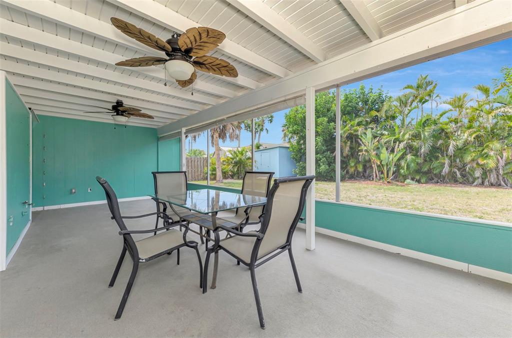 2490 Eleventh Street Englewood, FL 34224 - Photo 31 of 49 a view of a dining room with furniture window and outside view