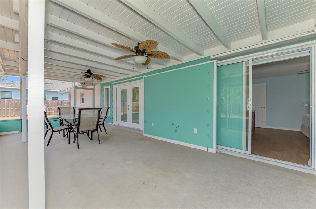 2490 Eleventh Street Englewood, FL 34224 - Photo 33 of 49 a view of a room with table and chairs