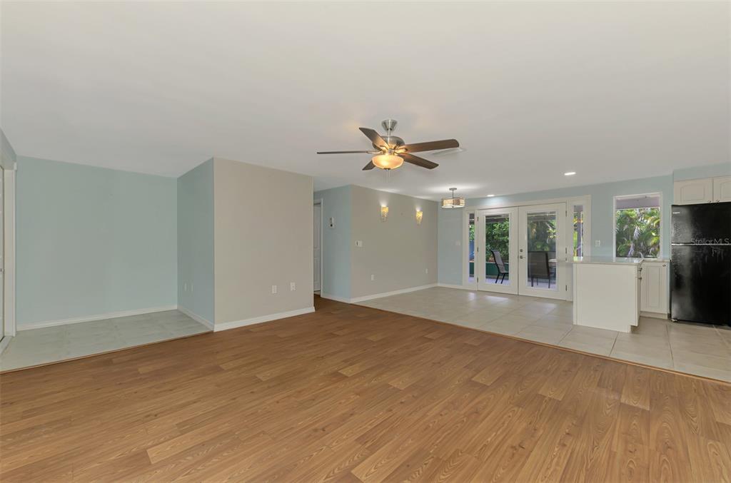 2490 Eleventh Street Englewood, FL 34224 - Photo 4 of 49 a view of an empty room with window and chandelier fan