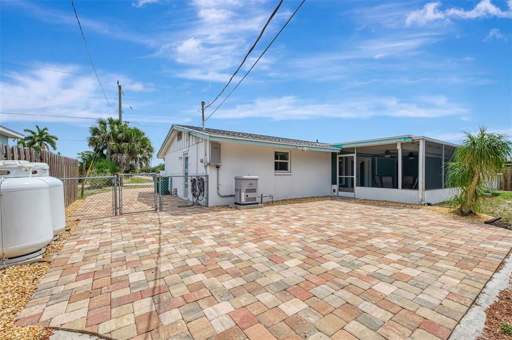 2490 Eleventh Street Englewood, FL 34224 - Photo 41 of 49 a house with yard in front of it