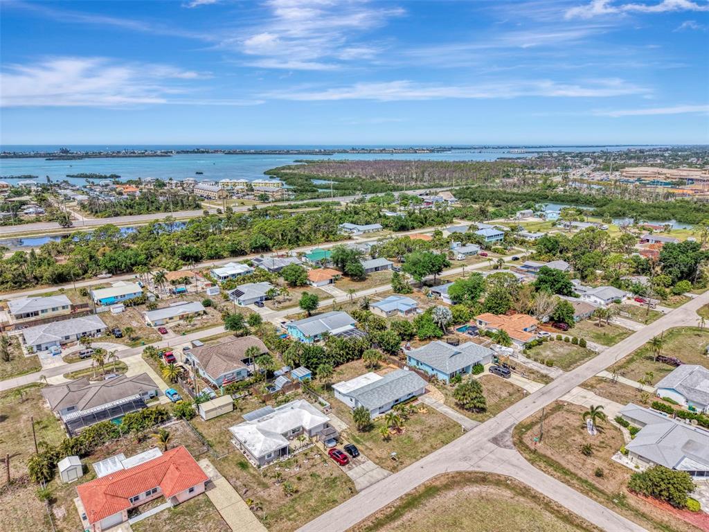 2490 Eleventh Street Englewood, FL 34224 - Photo 43 of 49 an aerial view of residential building with parking space
