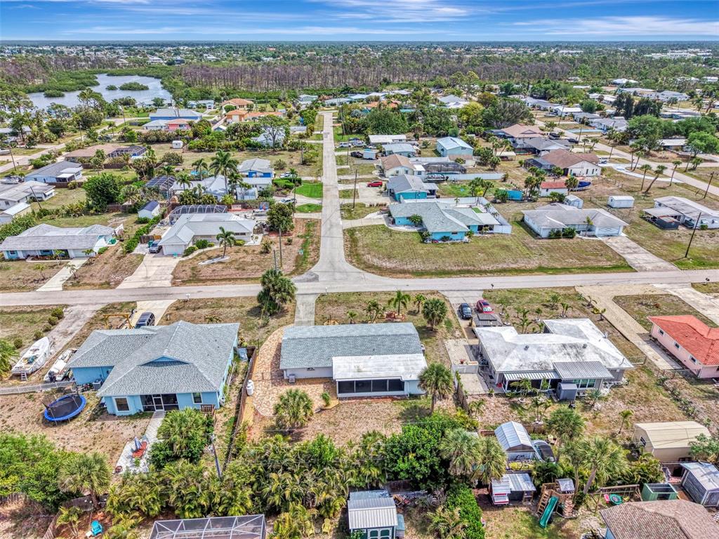 2490 Eleventh Street Englewood, FL 34224 - Photo 47 of 49 an aerial view of residential houses with outdoor space