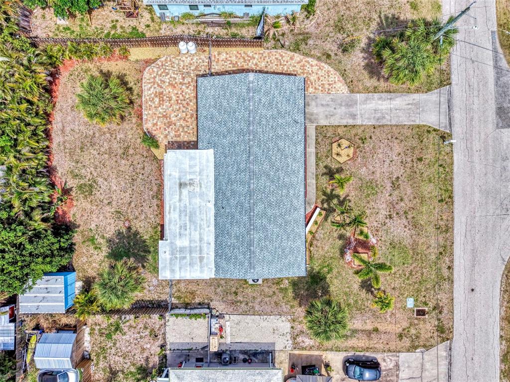 2490 Eleventh Street Englewood, FL 34224 - Photo 48 of 49 aerial view of a house with a yard and large trees