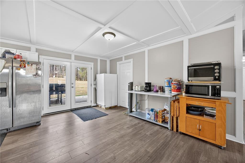 505 Stone Road McDonough, GA 30253 - Photo 12 of 28 a living room with furniture and a flat screen tv