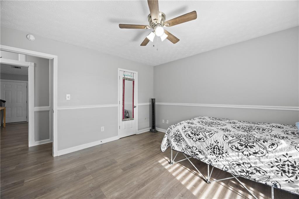 505 Stone Road McDonough, GA 30253 - Photo 21 of 28 a bedroom with a bed and a window