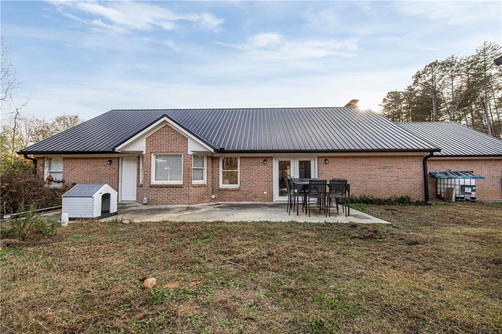 505 Stone Road McDonough, GA 30253 - Photo 28 of 28 a front view of a house with a yard and garage