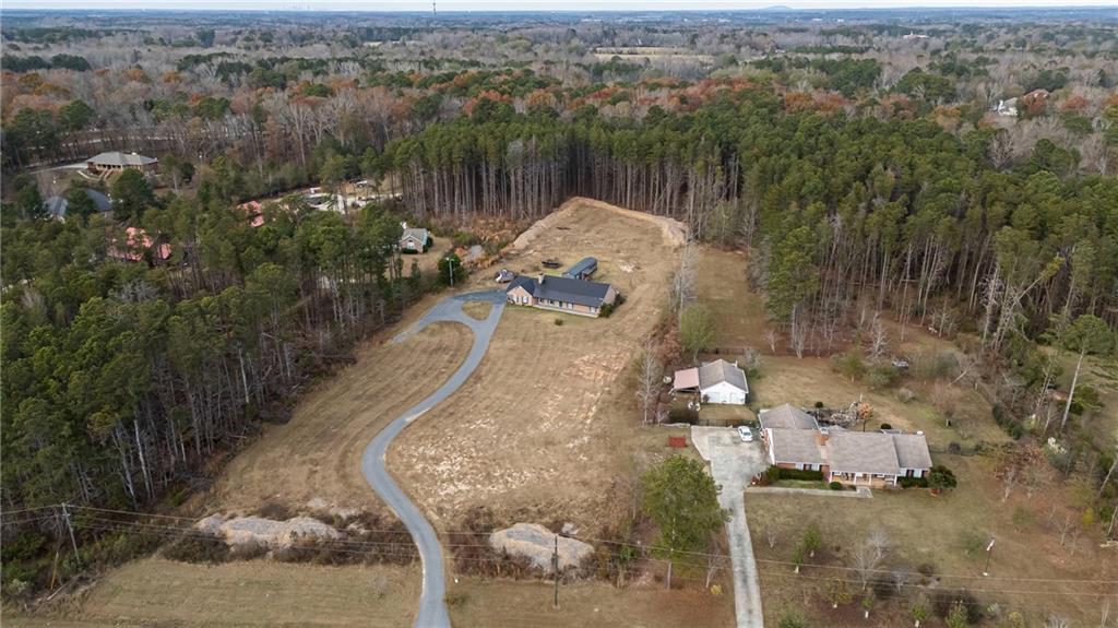 505 Stone Road McDonough, GA 30253 - Photo 3 of 28 a view of a lake in middle of the town