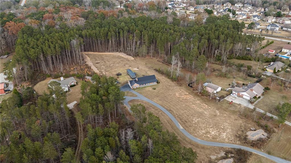 505 Stone Road McDonough, GA 30253 - Photo 4 of 28 a view of a backyard of a house
